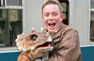 Dinky Dinosaur Adventure Man Holding Triceratops