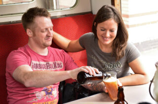 Rail Ale Trail Couple Pouring Ale